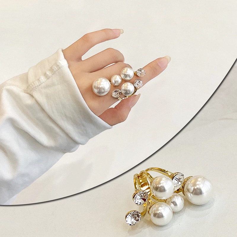 ภาพหน้าปกสินค้าแหวนมุก หลายชั้น อินเทรนด์ สําหรับผู้หญิง เลดี้ ไม่สม่ําเสมอ ปรับได้ แหวนเปิด หญิง เกาหลี งานแต่งงาน ปาร์ตี้ เครื่องประดับ ของขวัญ