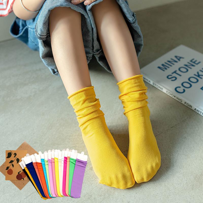 รูปภาพของถุงเท้าเด็ก 1-12 ขวบ ถุงเท้ายาว ถึงเท้าใต้เข่าเด็ก ถุงเท้ายาวสีพื้นเด็กลองเช็คราคา