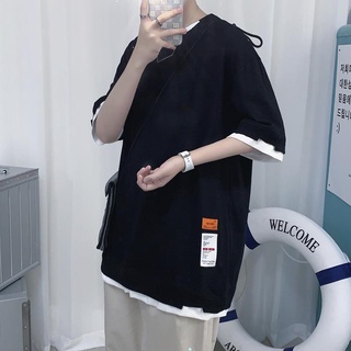 ﹍Ge Jason เสื้อยืดแขนสั้นผู้ชายฤดูร้อนสไตล์ฮ่องกง ins หลวมครึ่งแขนยาวผู้ชายขนาดใหญ่แบรนด์ความเห็นอกเห็นใจเสื้อผ้า