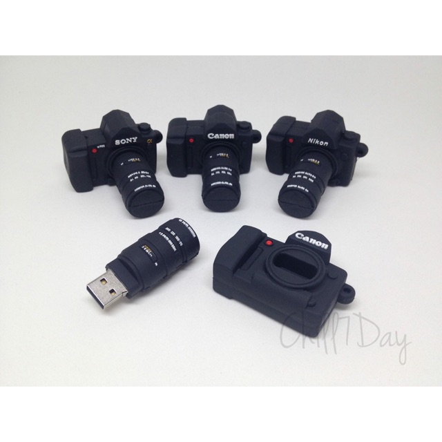 ภาพหน้าปกสินค้าแฟลชไดร์ฟ (Flash drive) รูปโมเดลกล้อง DSLR