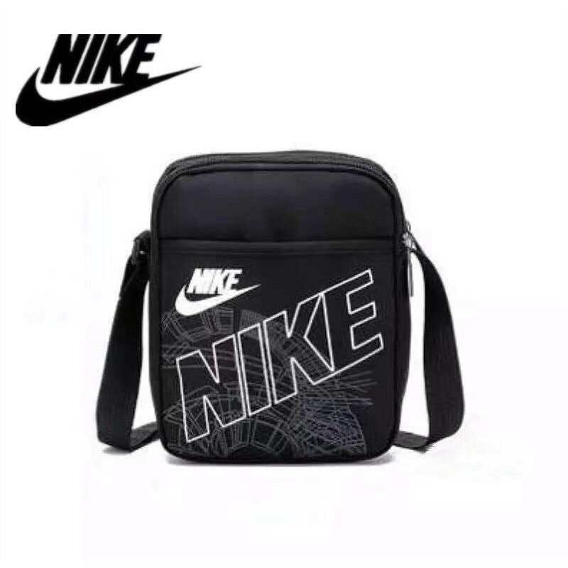 ภาพหน้าปกสินค้าNike Crossbody Bag กระเป๋าสะพายข้าง NO=E จากร้าน yfashionshop บน Shopee