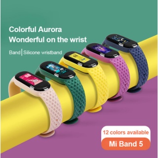 ภาพหน้าปกสินค้าสายนาฬิกาข้อมือซิลิโคนสําหรับ Xiaomi Mi Band 5 6 Mi Band 4 Mi5 ซึ่งคุณอาจชอบสินค้านี้