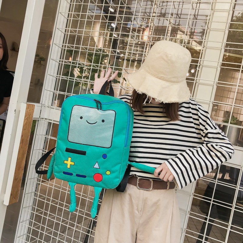 ภาพหน้าปกสินค้ากระเป๋าเป้สะพายหลัง ลายการ์ตูน Adventure Time WarnaIns Bmo Robot จากร้าน yico.th บน Shopee