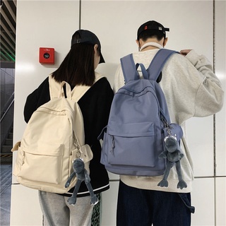 กระเป๋าเป้สะพายหลัง ใส่แล็ปท็อป กันน้ํา สีพื้น แบบเรียบง่าย สไตล์เกาหลี ฮาราจูกุ เหมาะกับการพกพาเดินทาง สําหรับผู้ชาย และผู้หญิง 15.6 นิ้ว