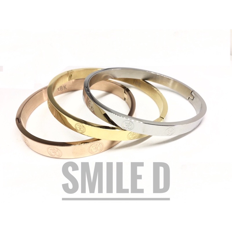 ภาพหน้าปกสินค้ากำไลโอมมหามงคล จากร้าน smiled_1984 บน Shopee