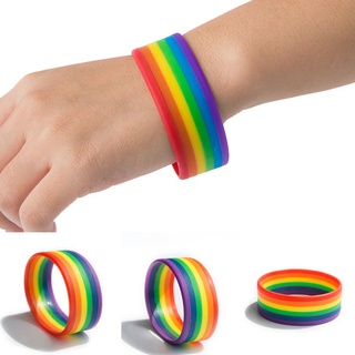 ภาพหน้าปกสินค้าสายรัดข้อมือสีรุ้ง สายรัดข้อมือสายรุ้ง สายรัดข้อมือ ริสแบนด์ย ซิลิโคน สีรุ้ง หลากสี LGBT Rainbow Silicone Wristband ที่เกี่ยวข้อง