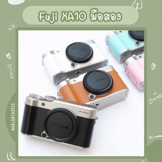 ภาพหน้าปกสินค้ากล้องฟูจิ Fuji XA10 พร้อมเลนส์ สภาพดี มือสอง [ส่งฟรี] ที่เกี่ยวข้อง