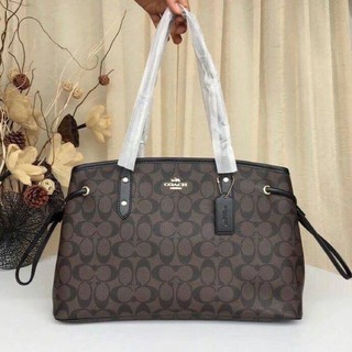 COACH SIGNATURE DRAWSTRING CARRYALL BAG