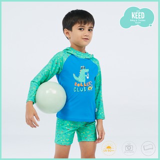 ภาพหน้าปกสินค้าKĖĖD :  ชุดเสื้อแขนยาวมีฮู้ดและกางเกงขาสั้น ผ้าลายสีเขียวตัดต่อผ้าพื้นสีฟ้า Hooded Sun Protective Set ที่เกี่ยวข้อง
