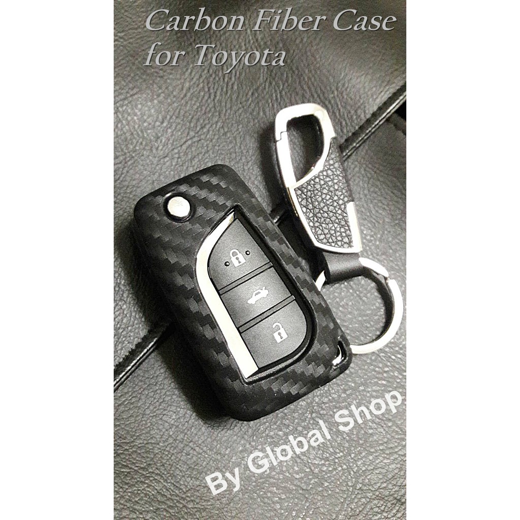 ภาพหน้าปกสินค้าเคสกุญแจ + พวงกุญแจ Carbon Fiber case Toyota โตโยต้า Revo/Altis โค้ด NEWFLIP0000 ลด 80 บาท
