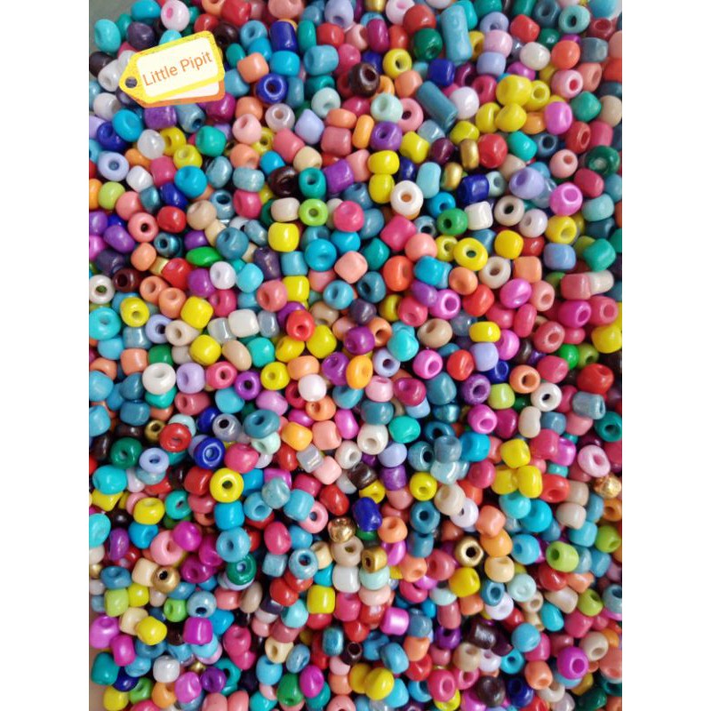 รูปภาพสินค้าแรกของSeed beads ลูกปัดเม็ดทราย คละสี / ใสเหลือบรุ้ง 50 กรัม สำหรับงาน DIY
