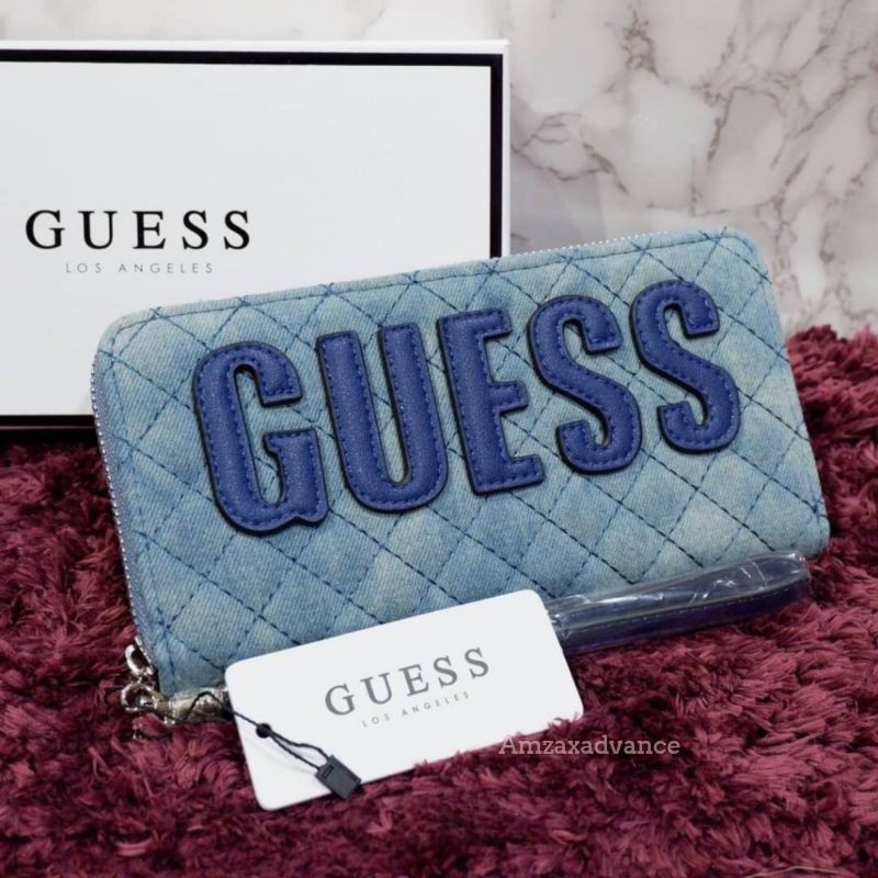 กระเป๋าสตางค์ใบยาว-guess-สวยคุ้มมี3ช่องใหญ่และ1ช่องเสียบบัตรงานแท้สวยคุ้ม