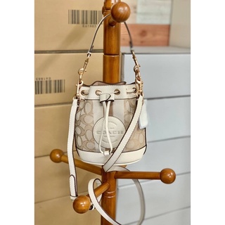 COACH MINI DEMPSEY BUCKET BAG IN SIGNATURE JACQUARD WITH STRIPE AND COACH PATCH (