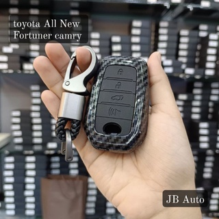 เคสกุญแจรถยนต์ ลายเคสเคฟล่าปุ่มซิลิโคน งานเงา สำหรับ toyota fortuner camry (พร้อมพวงกุญแจ)