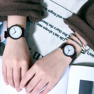 ภาพหน้าปกสินค้านาฬิกาข้อมือควอทซ์อะนาล็อก สีดํา สีขาว สไตล์สปอร์ต แฟชั่นคู่รัก สําหรับผู้หญิง และผู้ชาย ที่เกี่ยวข้อง
