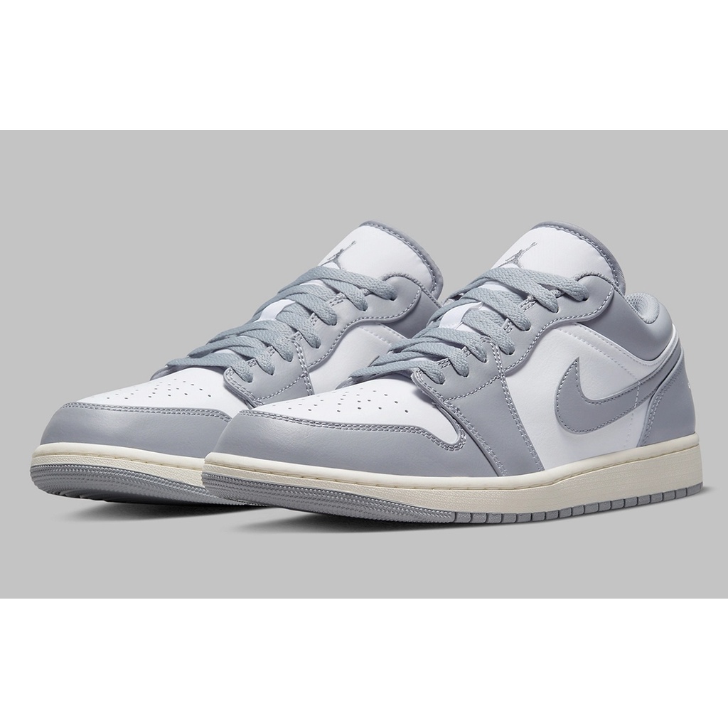 Grey low store top jordans