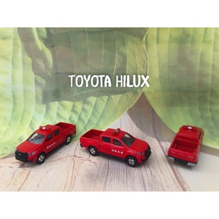 ภาพหน้าปกสินค้าTomica Toyota Hilux สีแดง มีหวอ ที่เกี่ยวข้อง
