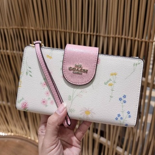 COACH TECH PHONE WALLET WITH SPACED WILDFLOWER