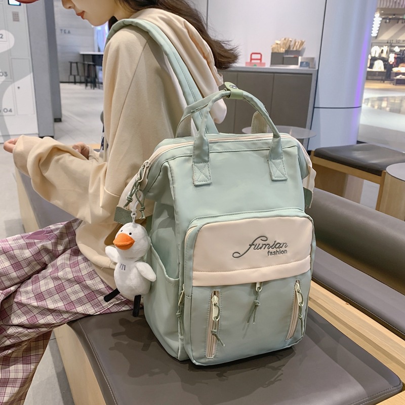 ภาพหน้าปกสินค้ากระเป๋าเป้สะพายหลัง กระเป๋านักเรียน จุของได้เยอะ เหมาะกับการเดินทาง แฟชั่นสําหรับเด็กผู้หญิง 2022