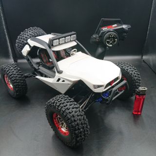 รถบัคกี้ วิทยุบังคับ Wltoys 12429 Higg Speed Storm สีขาว 4WD โช้คอย่างนิ่ม เร็ว แรง สะใจ อัตราส่วน 1/12 มีสปอร์ตไลท์หน้า