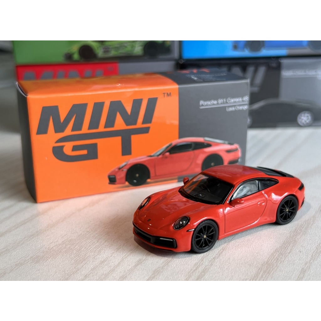 minigt-porsche-911-992-carrera-4s-lava-orange