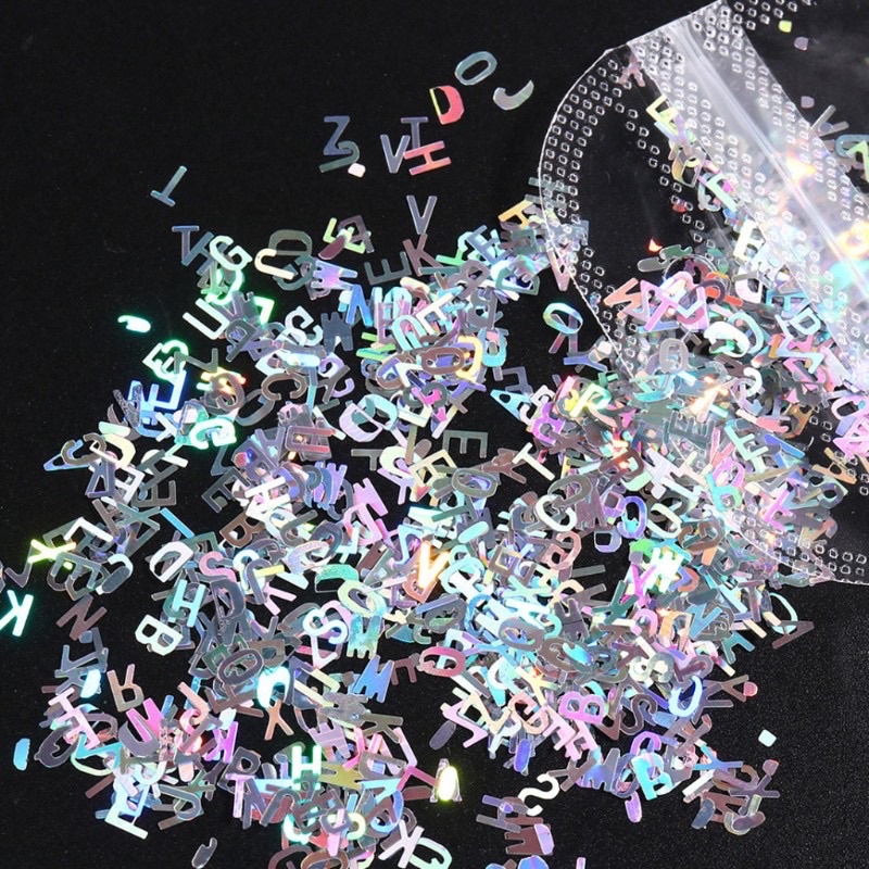 ภาพหน้าปกสินค้าตัวอักษรสีโฮโล (2g) Holographic Laser Letters Chunky Glitter จากร้าน hobbycolors บน Shopee