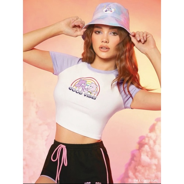 เสื้อครอปขาวม่วงพาสเทล-ลายแคร์แบร์-สินค้างานลิขสิทธิ์แท้100-x-care-bears-ครบรอบ-40-ปี-ของใช้-ของสะสม-งานหายาก