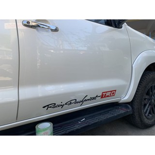 ภาพหน้าปกสินค้าสติกเกอร์ติดรถ toyota \"Trd racing devolopment\" ขนาดยาว 73 cm. 1 คู่ แปะได้ 2 ฝั่ง ซึ่งคุณอาจชอบราคาและรีวิวของสินค้านี้