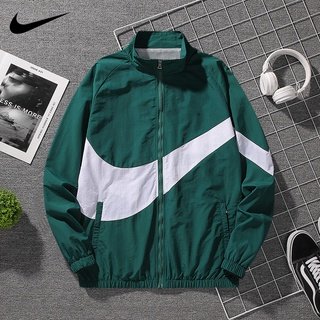 สินค้า Nike ของแท้ 100% เสื้อแจ็กเก็ต เสื้อกันลม ลําลอง ระบายอากาศ ทรงหลวม แฟชั่นฤดูใบไม้ผลิ และฤดูร้อน สําหรับผู้ชาย
