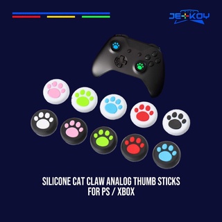 ภาพหน้าปกสินค้าซิลิโคน อนาล็อค เท้าแมว PS4 PS5 Xbox x one ที่เกี่ยวข้อง