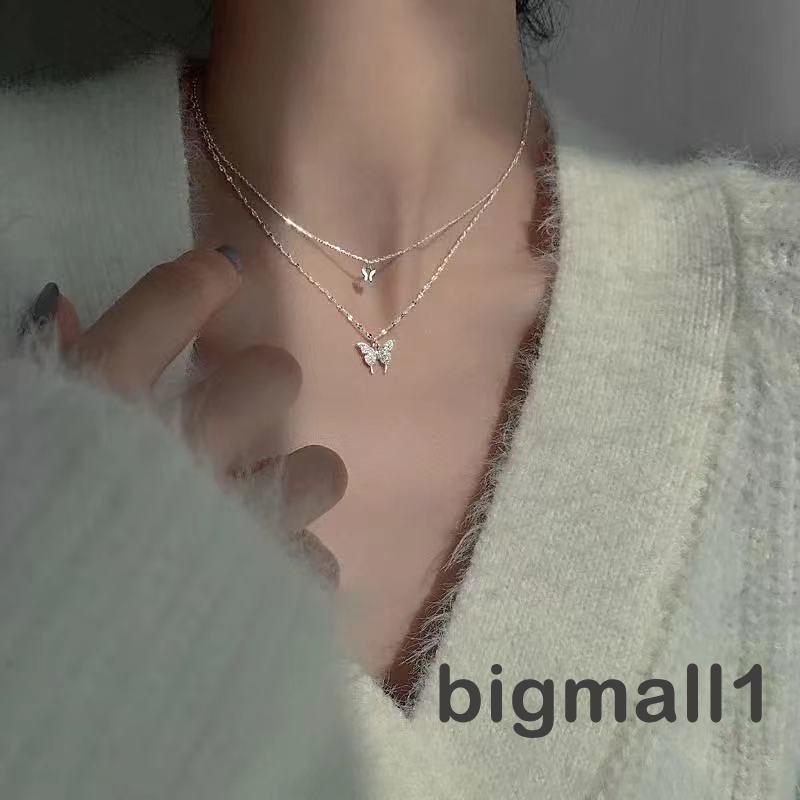 ภาพหน้าปกสินค้าBigmall- สร้อยคอโซ่สองชั้น จี้ผีเสื้อ ประดับพลอยเทียม เครื่องประดับ สําหรับผู้หญิง จากร้าน bigmall1.th บน Shopee