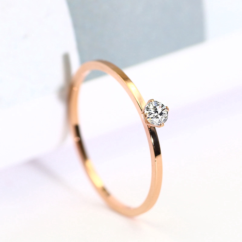 แหวนเหล็กไทเทเนียม-rose-gold-4-กรงเล็บ
