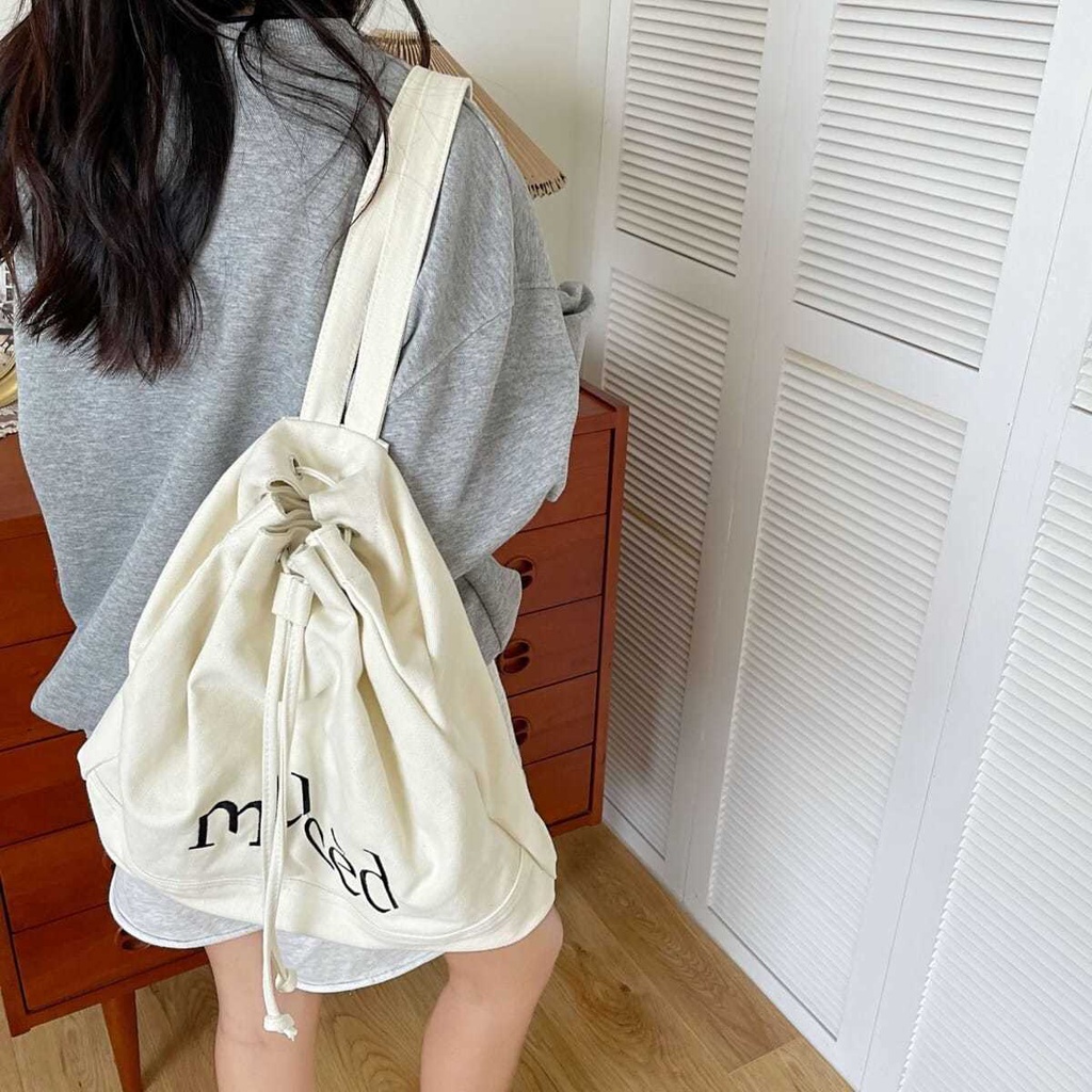 กระเป๋าสะพายข้าง-ญี่ปุ่นและเกาหลีใต้-ins-drawstring-กระเป๋าเป้สะพายหลังเย็บปักถักร้อยตัวอักษรความจุขนาดใหญ่ถุงถังกระเป๋า