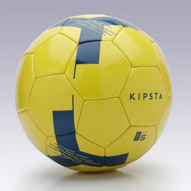 ภาพหน้าปกสินค้าลูกบอล Kipsta ลูกฟุตบอล รุ่น FIRST KICK เบอร์ 5 (สำหรับเด็กอายุ 8 ถึง 12 ปี) (สีเหลือง)