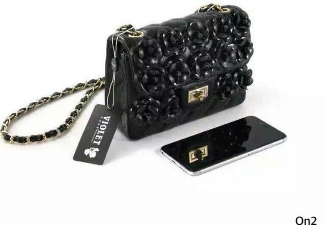 chanel-black-camellia-flap-bag