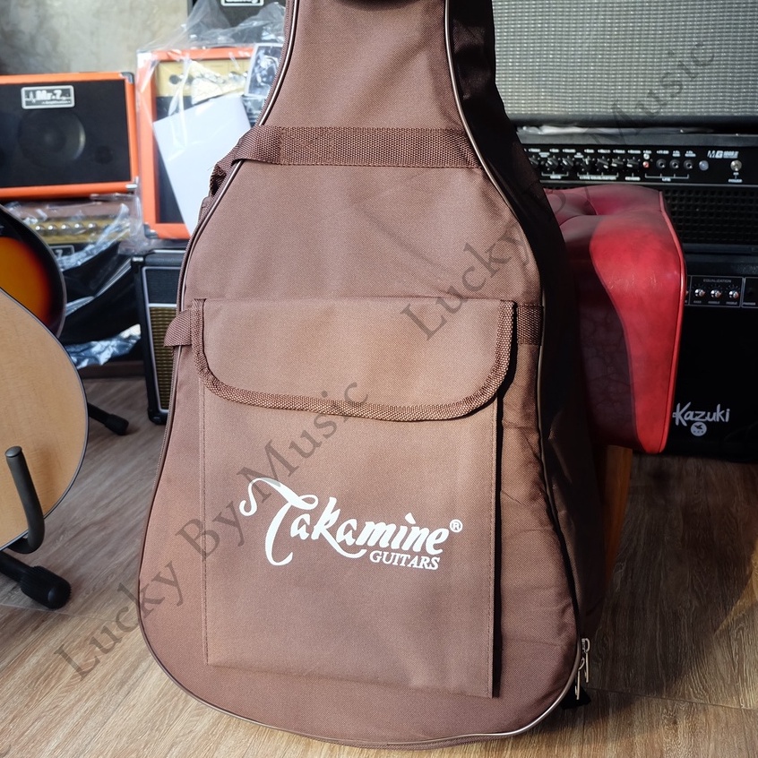 takamine-กระเป๋ากีต้าร์โปร่ง-บุฟองน้ำหนาถึง-12-มิล-ขนาด-41-นิ้่ว-สีน้ำตาล-มีช่องด้านหน้า-กระเป๋ากีต้าร์-กีต้าร์โปร่ง