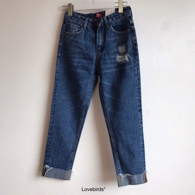 fold-legs-torn-boyfriend-jeans