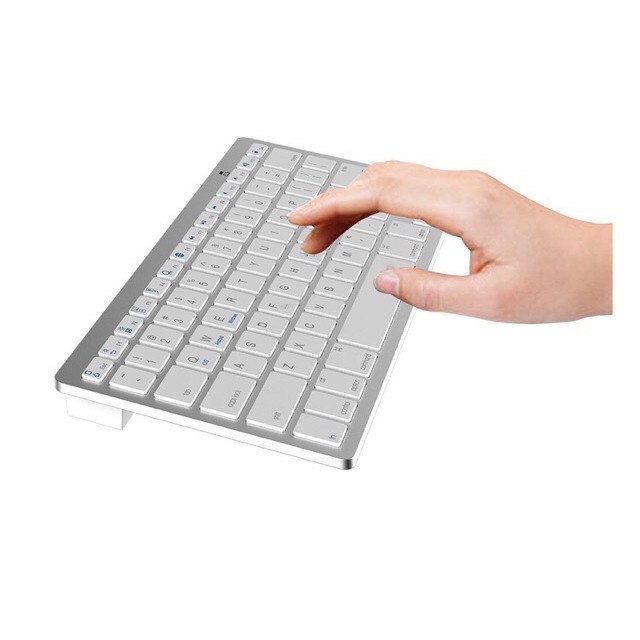 ภาพหน้าปกสินค้าKeyboard Bluetooth (สีขาว) แป้นพิมพ์บลูทูธไร้สาย คีย์บอร์ดบลูทูธ ภาษาไทย Wireless Keyboard