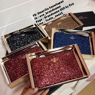 Coach คล้องแขน สีแดงเลือวัว กลิตเตอร์ สีเหมาะกับ เทศกาลมากค่ะ มาพร้อมกล่อง พร้อมส่งจ้า