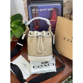 กระเป๋าถือ COACH DEMPSEY DRAWSTRING SMALL BUCKET IN SIGNATURE