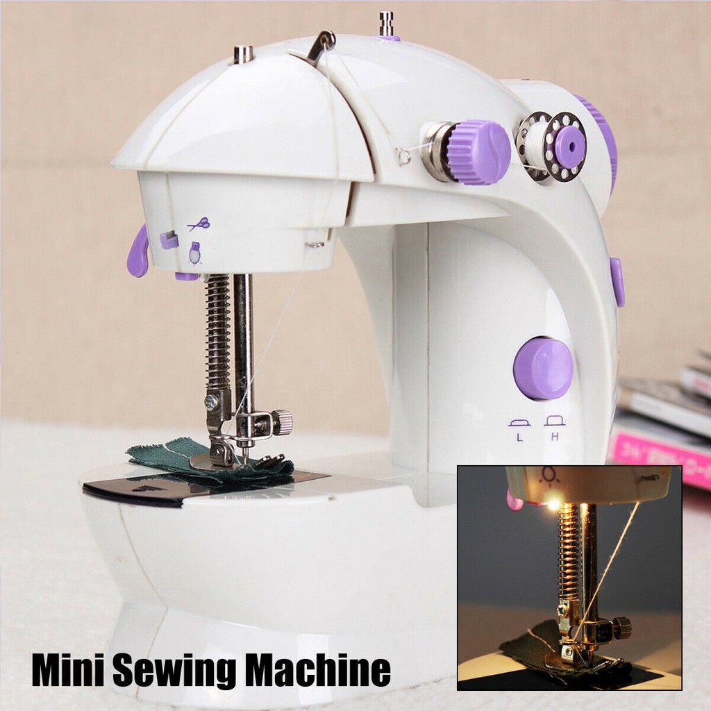 รูปภาพของเครื่องจักรเย็บผ้าขนาดเล็ก พกพาสะดวก รุ่น Mini Sewing Machine (สีม่วง)-ลองเช็คราคา