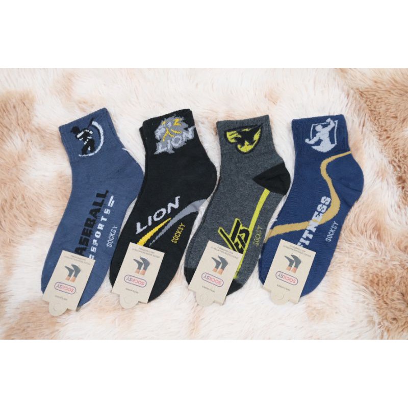 ภาพหน้าปกสินค้าแพค12คู่ ถุงเท้าลายสปอร์ต socksy ข้อกลาง จากร้าน fashion.socks.shop บน Shopee