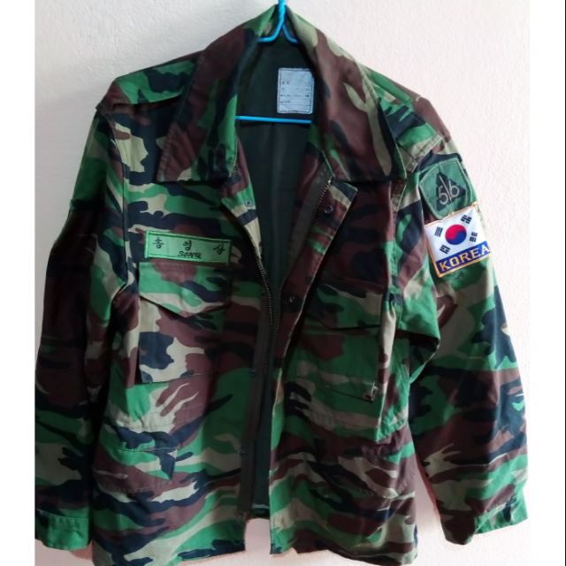 ภาพหน้าปกสินค้าเสื้อ แจ็คเก็ต ทหารเกาหลี เขียวลายพราง ใส่กันหนาวกันลม มีของแถมให้ด้วยครับผม