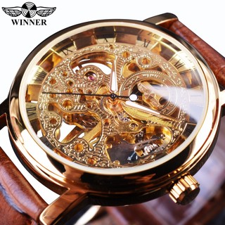 ผู้ชนะวินเทจโกลเด้นดีไซน์เรียบหรูแบบสบาย ๆ สายหนังสีน้ำตาลนาฬิกาบุรุษสุดยอดนาฬิกาโครงกระดูกแบบหรูหรา