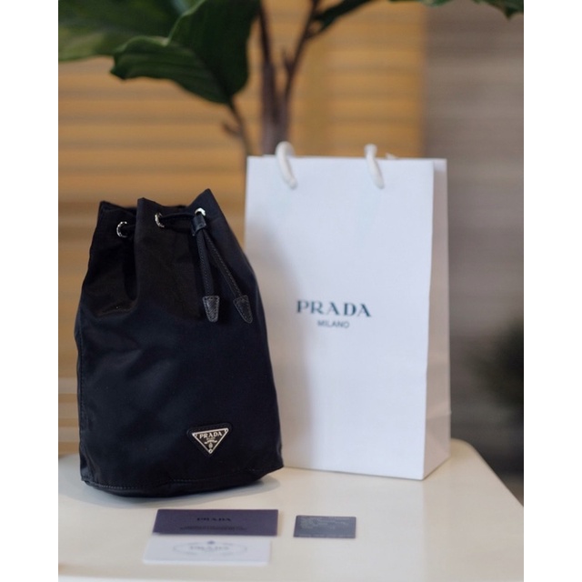 Prada bucket bag mini hotsell
