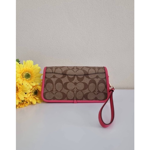 กระเป๋าคล้องมือ-coach-originals-wristlet-in-signature-canvas-coach-c2299-im-khaki-fuchsia-ลายซีสีน้ำตาล-สายสีชมพู