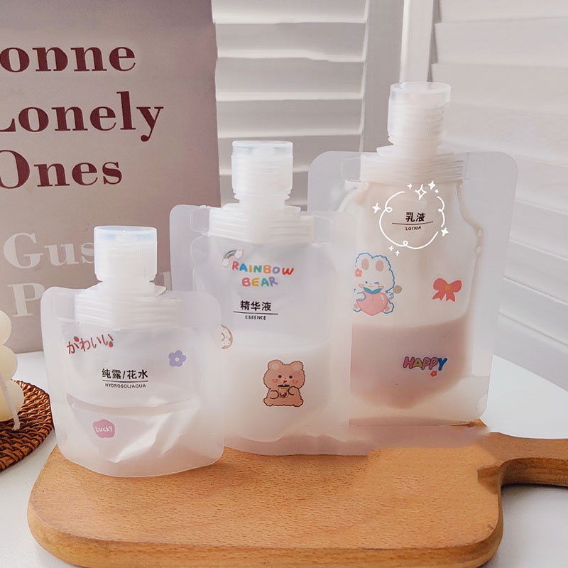 ภาพหน้าปกสินค้า30ml/50ml/100ml Portable Travel Lotion Flip-top Divided Bags/ Essential Oils Cosmetics Transparent Nozzle Bags/ Hand Sanitizer Shampoo Environmentally Friendly Plastic Storage Bags จากร้าน bluelove.th บน Shopee