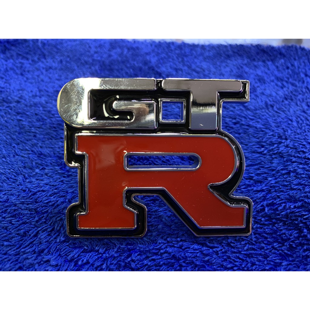 gtr-nissan-skyline-logo-ป้าย-ตรา-รถแข่ง-โลโก้-นิสสัน-สกายลาย-โครเมียม-กระจังหน้า-โลหะ