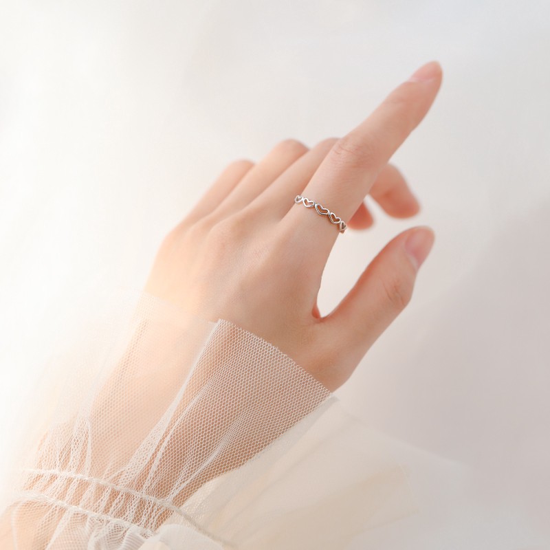 ภาพหน้าปกสินค้าแหวนสวมนิ้ว ฉลุลาย รูปหัวใจ สไตล์เกาหลี สำหรับผู้หญิง