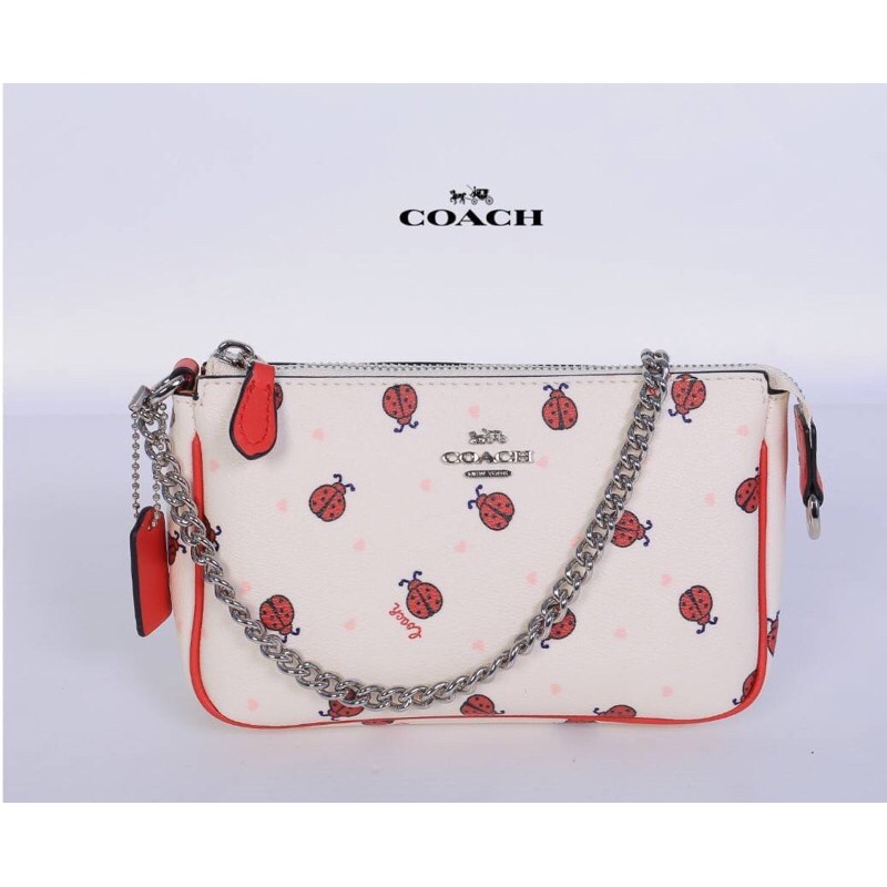 coach-handle-pouch-signature-ladybug-print